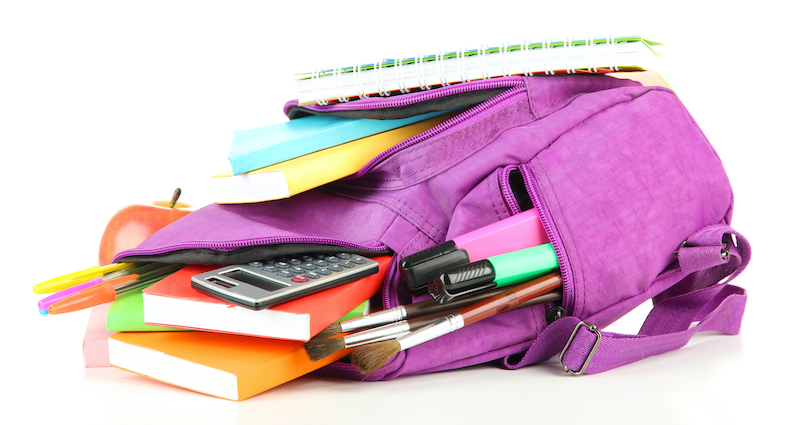 a backpack full of supplies and books